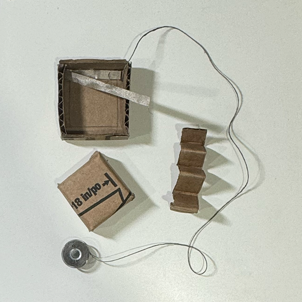 This is an image of all the key cap parts together, the shell, the spring and the keycap itself.