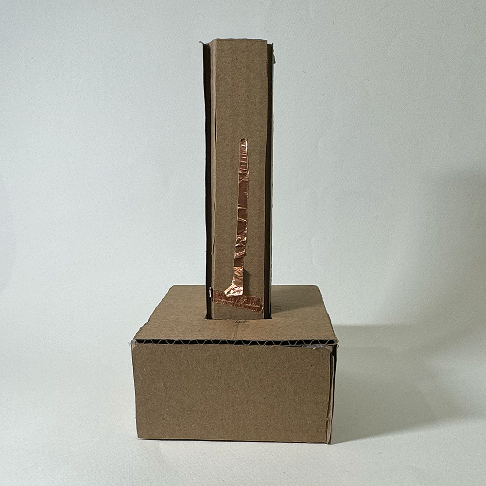 This is a final shot of my first carboard prototype. Unfortunatley, I forgot to film a demo of it working but it was shown in class to work.