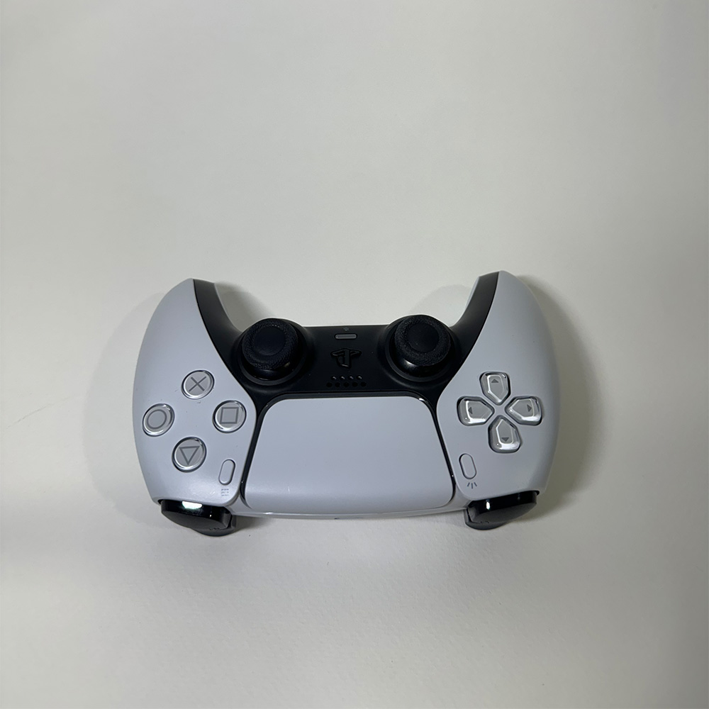 This photo is of the controller upside down so the front buttons were more easily seen.