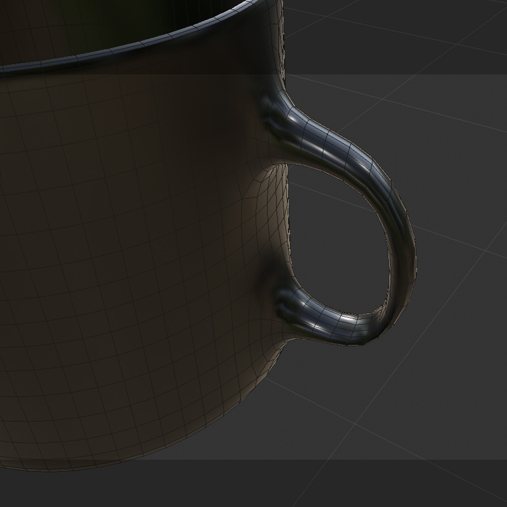I then extruded, rotated, and bridged two polygons to create the handle of the mug. Finally I used the subdivision surface to create a more organic form.