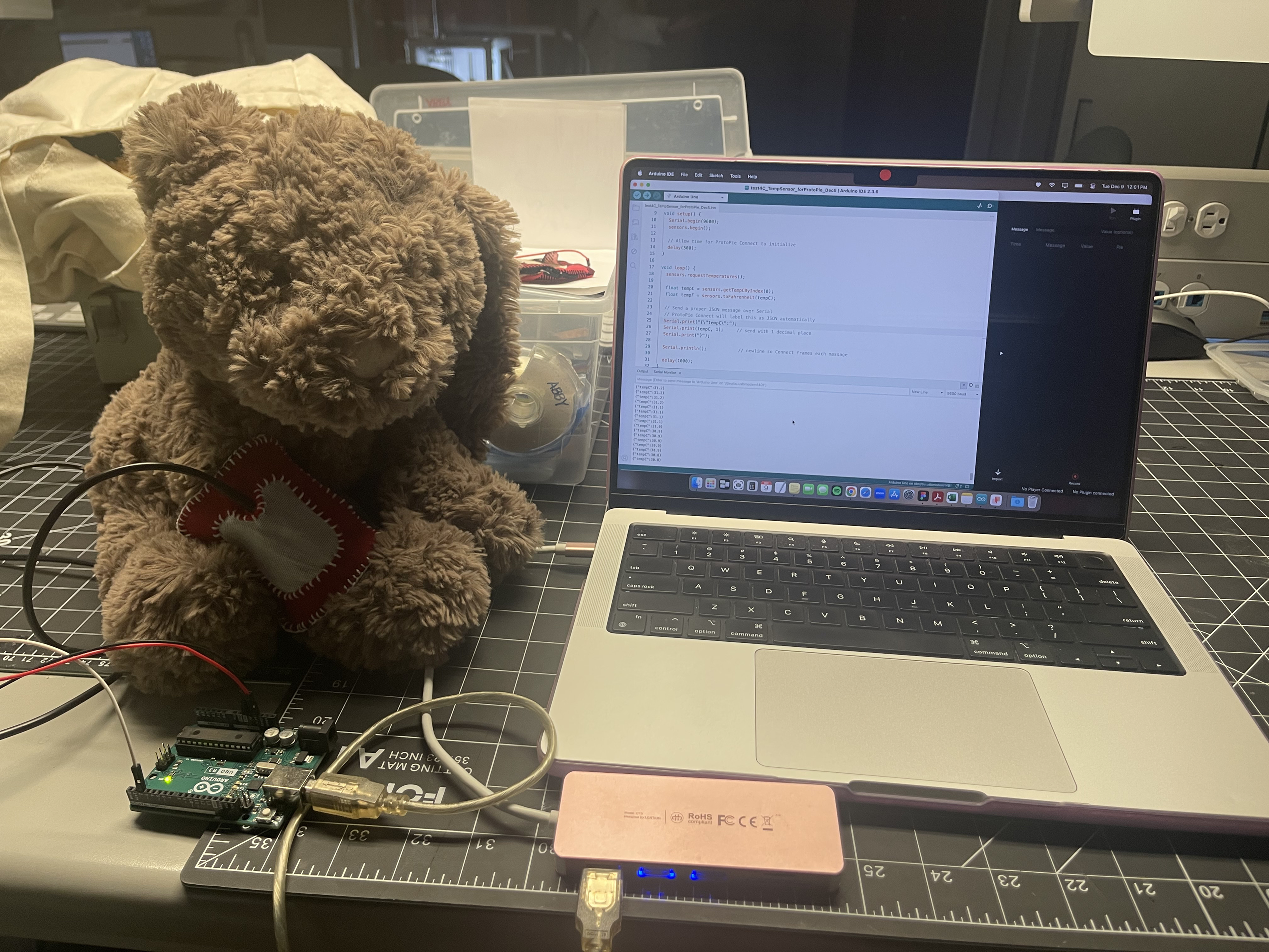 This is an image of the final version of our prototype that we could complete within the time frame of the project. This is Miffy our health monitoring companion that utilizes a temperature probe sensor to read body temperature and worn caregivers of any changes in temperature (like a fever).